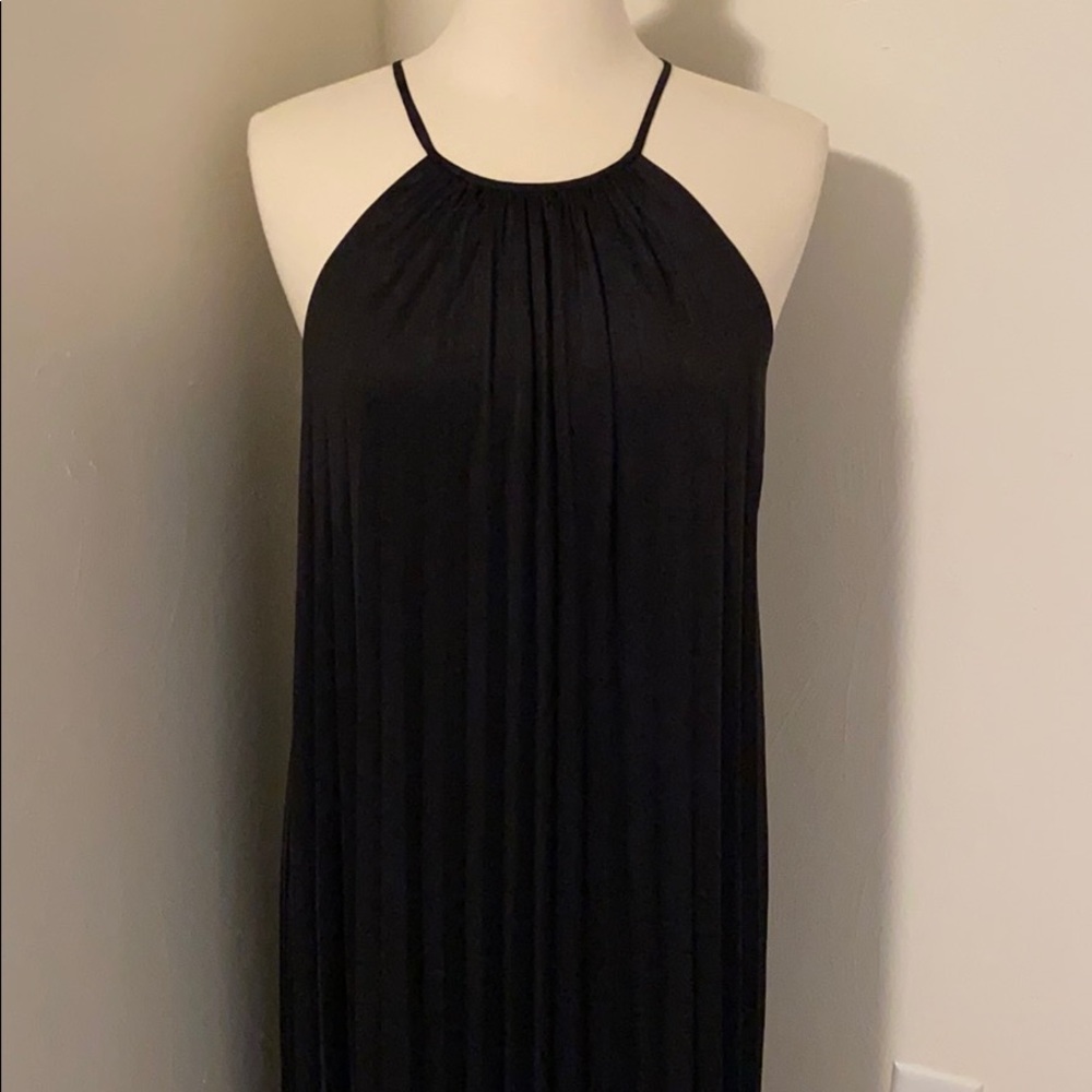 Black sleeveless dress.